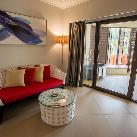 Sand & Sandals Desaru Beach Resort & Spa Kültér fotó A room at the hotel