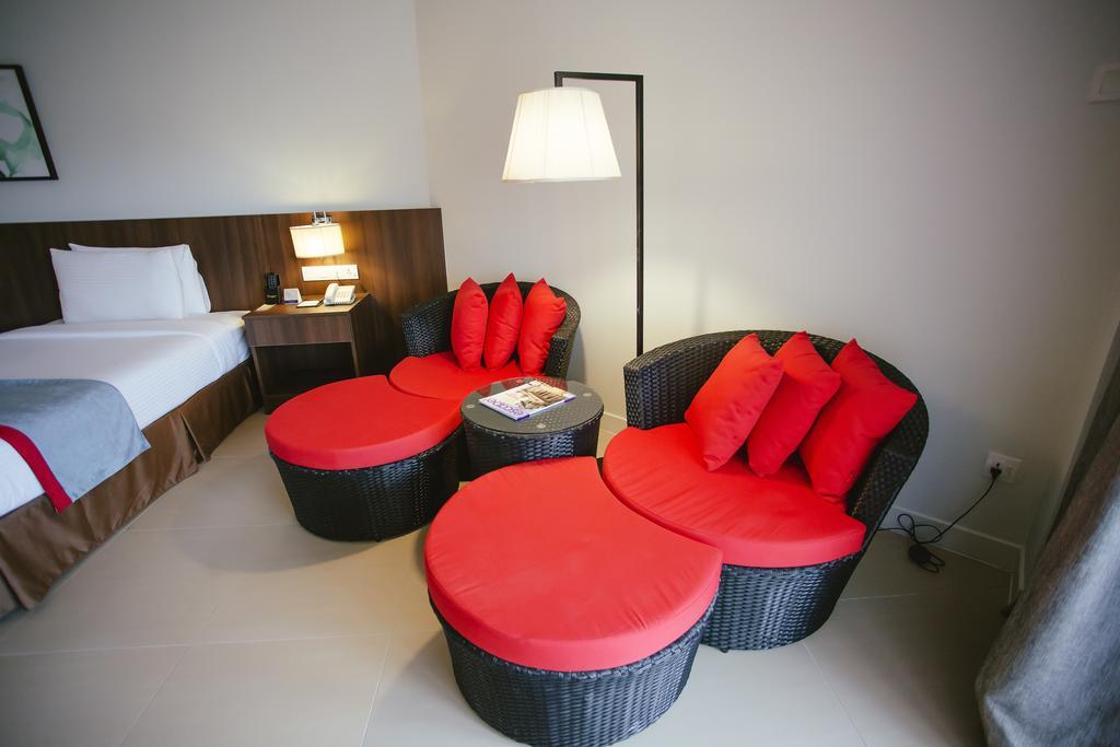 Sand & Sandals Desaru Beach Resort & Spa Kültér fotó A room at the hotel