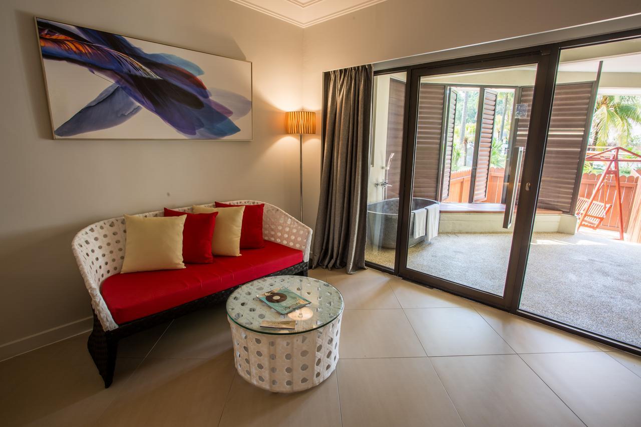 Sand & Sandals Desaru Beach Resort & Spa Kültér fotó A room at the hotel